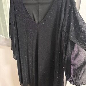 Black sequin mini dress with sheer sleeves #sequindress